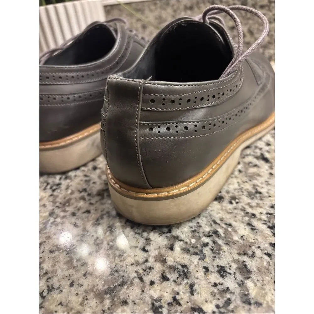 Unlisted by Kenneth Cole Men's Black Leather Wingtip Oxfords with Tan Welt